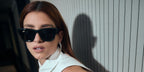 Dixie D'Amelio was seen wearing black Ray-Ban Wayfarer Puffer RB 4940 601/87 sunglasses in her social media post, May 2025.