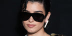 Dixie D'Amelio was seen wearing black Saint Laurent Sun SL 609 Carolyn 001 sunglasses at the Saint Laurent Spring/Summer 2024 fashion show during Paris Fashion Week.