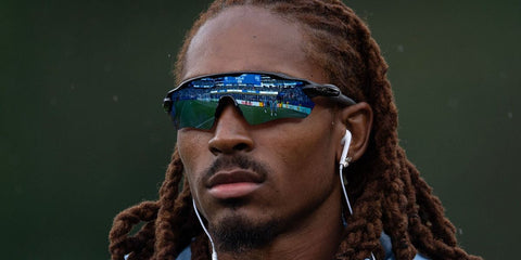 Footballer Djed Spence was seen wearing black Oakley Radar EV Path OO9208 55 sunglasses with Prizm h2o Polarised lenses at the FIFA World Cup 2026.