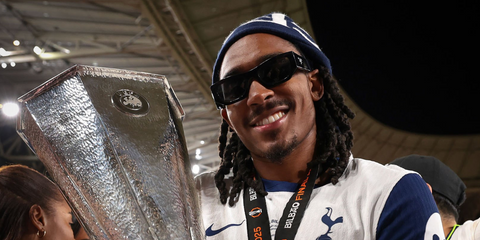 Footballer Djed Spence of Tottenham Hotspur was seen wearing black Prada PR A01S 16K08Z sunglasses following the victory in the UEFA Europa League Final 2025.