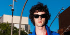Dominic Sessa was seen wearing the iconic Ray-Ban Wayfarer 2140 901 Black sunglasses in a GQ Hype feature, July 2026 promoting his new biopic film "Tony" about Anthony Bourdain.