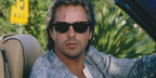 Don Johnson is seen wearing tortoiseshell Ray-Ban Wayfarer 2140 954 sunglasses in his iconic series Miami Vice