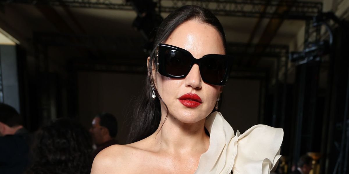 Tunisian actress Dorra Zarrouk was seen wearing black Saint Laurent Sun Blaze SL M119 001 sunglasses at the Georges Chakra Haute Couture Fall/Winter 2025 fashion show during Paris Couture Week. Shop online now on Pretavoir