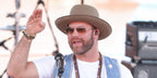 American country singer Drake White was seen wearing Ray-Ban Aviator 3025 001/51 Gold/Light Brown Gradient sunglasses at the CMA Fest 2022 in Nashville, Tennessee.