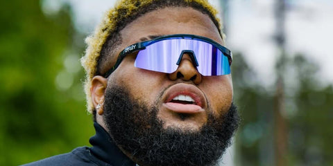 American comedian Druski was seen wearing translucent blue Oakley Hydra OO9229 07 Prizm sunglasses, photographed by Josh Ceranic in May 2024. Shop online now on Pretavoir