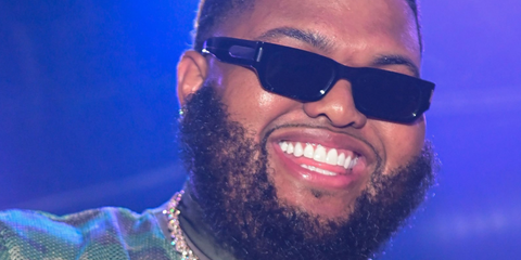 American comedian Druski was seen wearing black Saint Laurent Sun SL 660 001 rectangular sunglasses in Atlanta, March 2025. Shop online now on Pretavoir