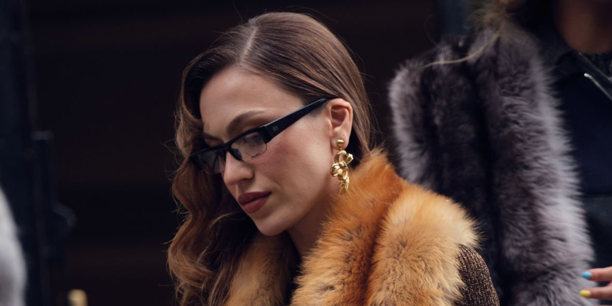 Turkish influencer and YouTuber Duygu Ozaslan was seen wearing black Miu Miu MU B07S 16K08N Blue Control sunglasses at the Miu Miu Spring/Summer 2026 fashion show during Paris Fashion Week.