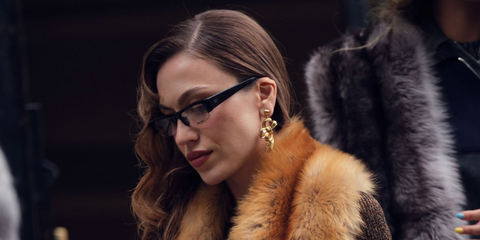 Turkish influencer and YouTuber Duygu Ozaslan was seen wearing black Miu Miu MU B07S 16K08N Blue Control sunglasses at the Miu Miu Spring/Summer 2026 fashion show during Paris Fashion Week.