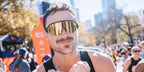 Dylan Efron was seen wearing matte carbon black Oakley Sutro Lite OO9463 13 sunglasses with Prizm 24k sunglasses at the TCS New York City Marathon 2024
