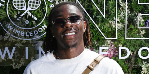 Footballer Eberechi Eze was seen wearing gold Cartier CT0465S 001 rectangular rimless sunglasses with dark grey lenses at the Wimbledon Tennis Championships 2025. Shop online now on Pretavoir