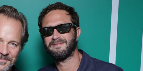 Actor Ebon Moss-Bachrach was seen wearing dark tortoiseshell Prada PR B11S 17N20G Polarised sunglasses at the US Open 2025. Shop online now on Pretavoir