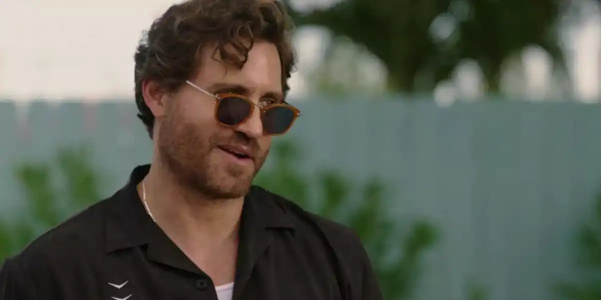Edgar Ramirez was seen wearing brown orange Oliver Peoples OP-506 OV5350S 1578/R5 sunglasses with blue lenses in the 2023 Netflix series Florida Man