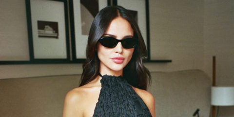 Eiza Gonzalez wears Prada PR 26ZS 16K08Z sunglasses at the Prada Spring/Summer 2024 Fashion Show in Milan