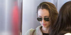 Actress Eliza Dushku was seen wearing gold Ray-Ban Aviator RB 3025 181 sunglasses at LAX