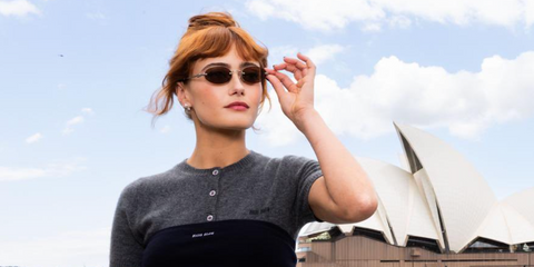 Ella Purnell was seen wearing silver Miu Miu MU A54S 1BC90Q sunglasses with brown lenses at the Fallout season 2 press tour in Sydney, Australia, November 2025.