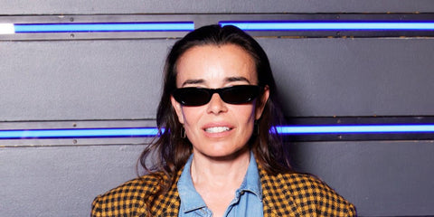 French actress Elodie Bouchez was seen wearing black Saint Laurent Sun SL 557 Shade 001 sunglasses in Paris, June 2024. Shop online now on Pretavoir