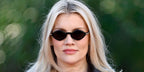 Actress and director Emerald Fennell was seen wearing black Cartier CT0540S 001 sunglasses at the London photo call of Wuthering Heights, February 2026.