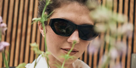 Actress Emily Bader was seen wearing black Bottega Veneta BV1221S 001 sunglasses in a Rose & Ivy Journal, photographed by Daniel G. Castrillon