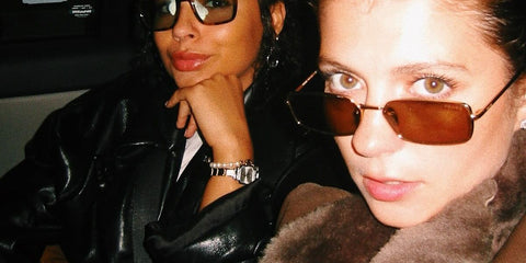 Actress Emily Bader was seen wearing gold Prada PR A60S 5AK70G rectangular sunglasses in her Instagram post, April 2026.