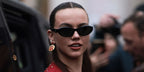 Emma Brooks was seen wearing black Prada PR 26ZS 16K08Z sunglasses to attend the Paco Rabanne FallWinter 2024 fashoin show during Paris Fashion Week