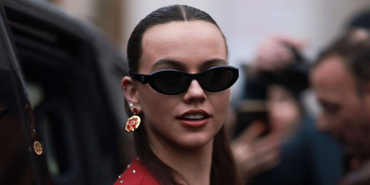 Emma Brooks was seen wearing black Prada PR 26ZS 16K08Z sunglasses to attend the Paco Rabanne FallWinter 2024 fashoin show during Paris Fashion Week