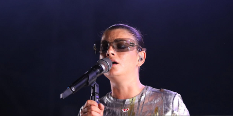 Italian singer Emma Marrone was seen wearing silver Miu Miu Rimless Runway MU 54YS 1BC10F sunglasses onstage at Anfiteatro Ivan Graziani in Algero, Italy, July 2024.