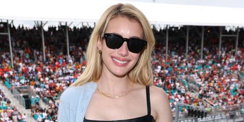 Emma Roberts was seen wearing black Oliver Peoples Rueny OV5601SU 1731/P2 sunglasses with midnight Polarised lenses at the F1 Miami Grand Prix 2026.