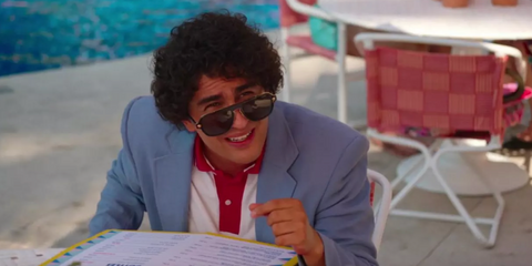 Mexican actor Enrique Arrizon was seen wearing black and gold Versace Medusa Charm 2199 1002/81 Polarised sunglasses in Acapulco, season 1 episode 6 as Maximo Gallardo.