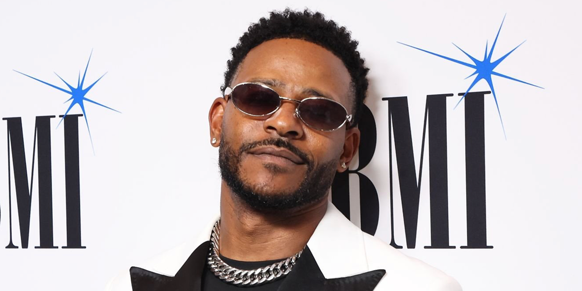 Singer Eric Bellinger was seen wearing silver Bottega Veneta Sardine BV1386S 003 oval sunglasses at the BMI R&B/Hip-Hop Awards 2026.