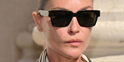 American model Erin Wasson was seen wearing dark tortoiseshell and black Saint Laurent SL 732 Vadim 003 square sunglasses at the Saint Laurent Menswear Spring/Summer 2026 fashion show during Paris Men's Fashion Week