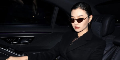 French model Estelle Chen was seen wearing gold Alexander McQueen AM0522S 002 cat eye sunglasses with brown lenses at the Alexander McQueen Spring/Summer 2026 fashion show during Paris Fashion Week. Shop online now on Pretavoir