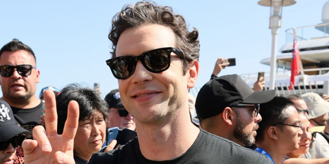 Star Trek actor Ethan Peck was seen wearing the iconic Ray-Ban Wayfarer 2140 901 Black sunglasses at the 2024 Comic-Con International in San Diego, California