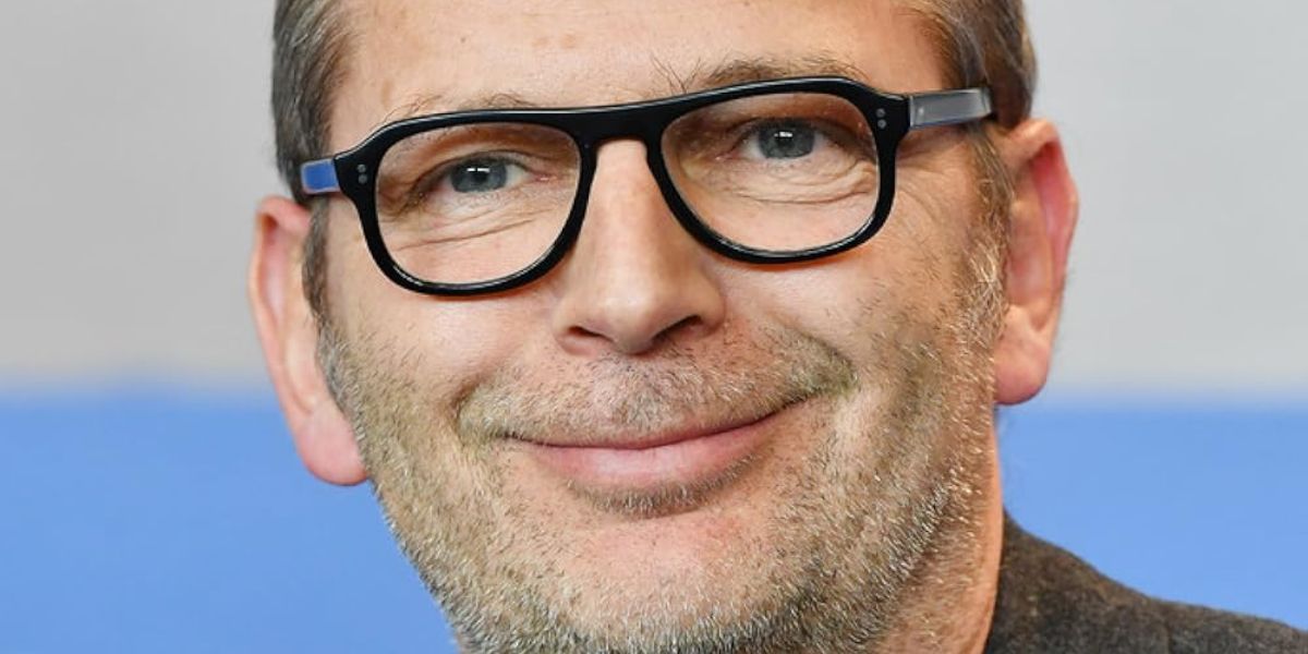 French director and producer Etienne Comar was seen wearing Cutler and Gross 0822 Black optical glasses