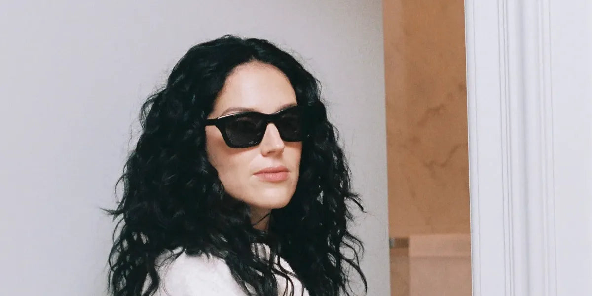 French-American actress Eva Victor was seen wearing black Loewe Slim LW40177I 01A sunglasses in a Vogue feature, ahead of the Loewe Spring/Summer 2026 fashion show during Paris Fashion Week.