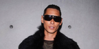 Evan Mock wears Saint Laurent Sun SL 569 Y 001  sunglasses at the brand's menswear Fall/Winter 2023 fashion show in Paris