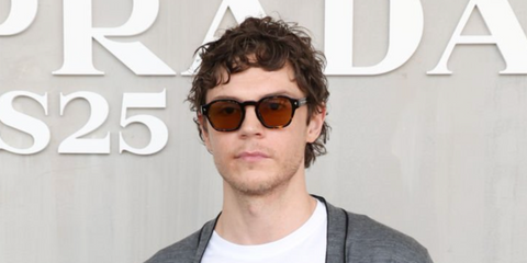 Evan Peters attends the Prada Spring/Summer 2025 Menswear Fashion Show wearing Prada PR A16S 14O60F Photochromic sunglasses - buy online. 
