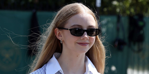 Actress Evie Templeton was seen wearing black Miu Miu MU A06S 16K08Z sunglasses at the Wimbledon Tennis Championships 2026.