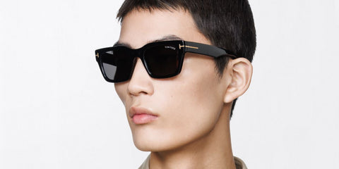 Male model wears Tom Ford TF1333 01A black sunglasses