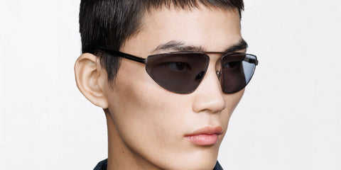 Male model wears Tom Ford Parker-02 TF1399 13A grey metal sunglasses