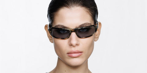 Female model wears Tom Ford Addison-02 TF1400 56A honey havana wraparound sunglasses