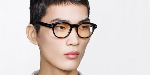 Male model wears Tom Ford TF6121 B 052 Blue Control round havana glasses