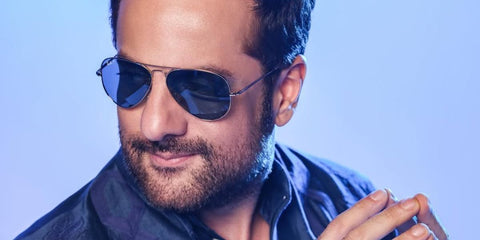 Bollywood actor Fardeen Khan was seen wearing silver Ray-Ban Aviator Large Metal RB 3025 003/02 sunglasses with blue Polarised lenses in his Instagram post