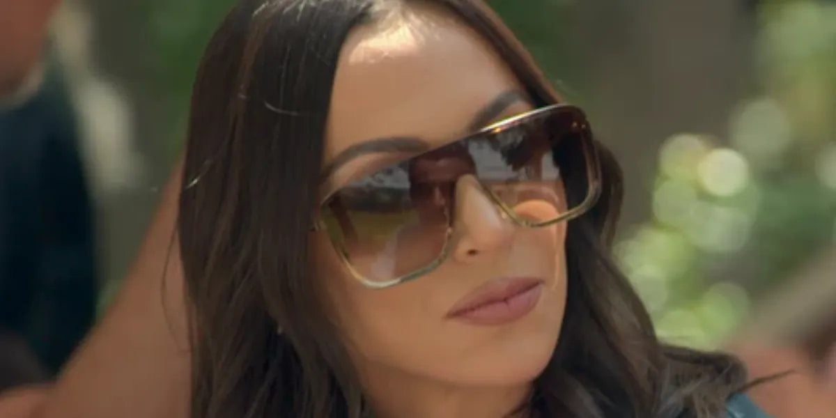 Reality TV personality Farrah Aldjufrie, daughter of Kyle Richards, was seen wearing gold Saint Laurent Sun SL 364 MASK 006 sunglasses with brown gradient lenses in Buying Beverly Hills.