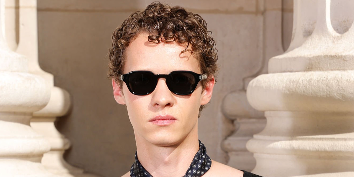 Actor Felix Kammerer was seen wearing black Saint Laurent Sun SL 946 001 sunglasses at the Saint Laurent Menswear Spring/Summer 2027 fashion show during Paris Men's Fashion Week.