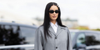 Creative Director and DJ Fiona Zanetti was seen wearing black Prada PR 26ZS 16K08Z sunglasses at the Prada Spring/Summer 2024 fashion show during Milan Fashion Week