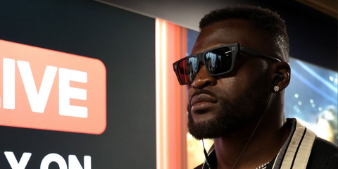 French-Cameroonian mixed martial artist Francis Ngannou was seen wearing matte black Dita Venzyn DTS720 03 sunglasses before his heavyweight bout against Philipe Lins during the main card of Netflix's Ronda Rousey vs. Gina Carano in Inglewood, California, May 202.