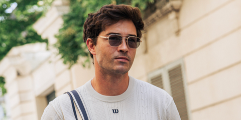 Model Francisco Lachowski was seen wearing gold David Beckham DB 1229/S T5U8J sunglasses with green to grey Photochromic lenses during French Open 2026, shared on Instagram in May 2026.