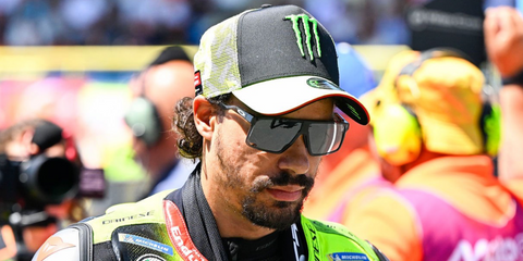 Italian motorcycle racer Franco Morbidelli was seen wearing transparent grey Oakley Helux OO9285 07 square sunglasses with Prizm black lenses at the MotoGP of Netherlands 2026.