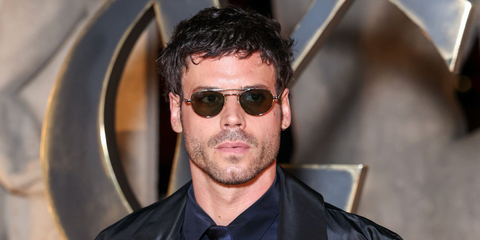 Canadian actor Francois Arnaud was seen wearing silver Saint Laurent Sun SL 97 002 sunglasses at the Saint Laurent Fall/Winter 2026 fashion show during Paris Fashion Week.