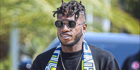 Brazilian footballer Fred was seen wearing silver Dolce&Gabbana DG2295 05/87 round aviator sunglasses in his Facebook profile photo.